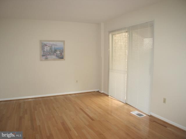 9247 Three Oaks Drive Silver Spring, MD 20901 - Photo 17 of 30 an empty room with a workbench