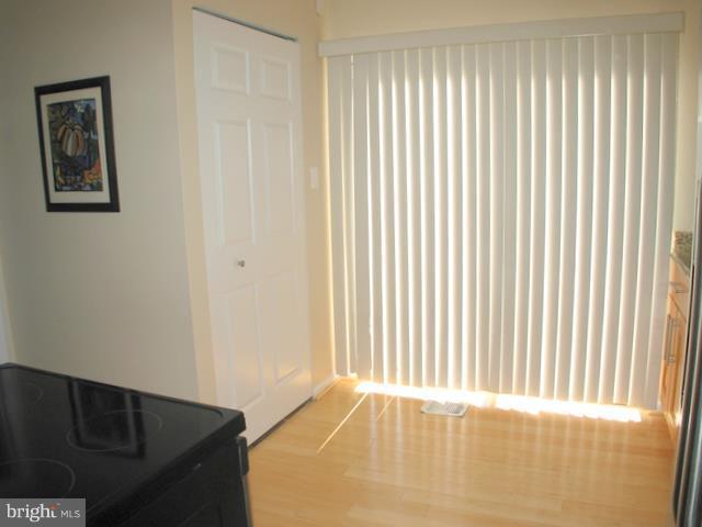 9247 Three Oaks Drive Silver Spring, MD 20901 - Photo 22 of 30 a view of an empty room with a window