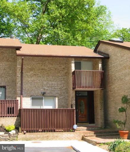 9247 Three Oaks Drive Silver Spring, MD 20901 - Photo 29 of 30 a front view of a house