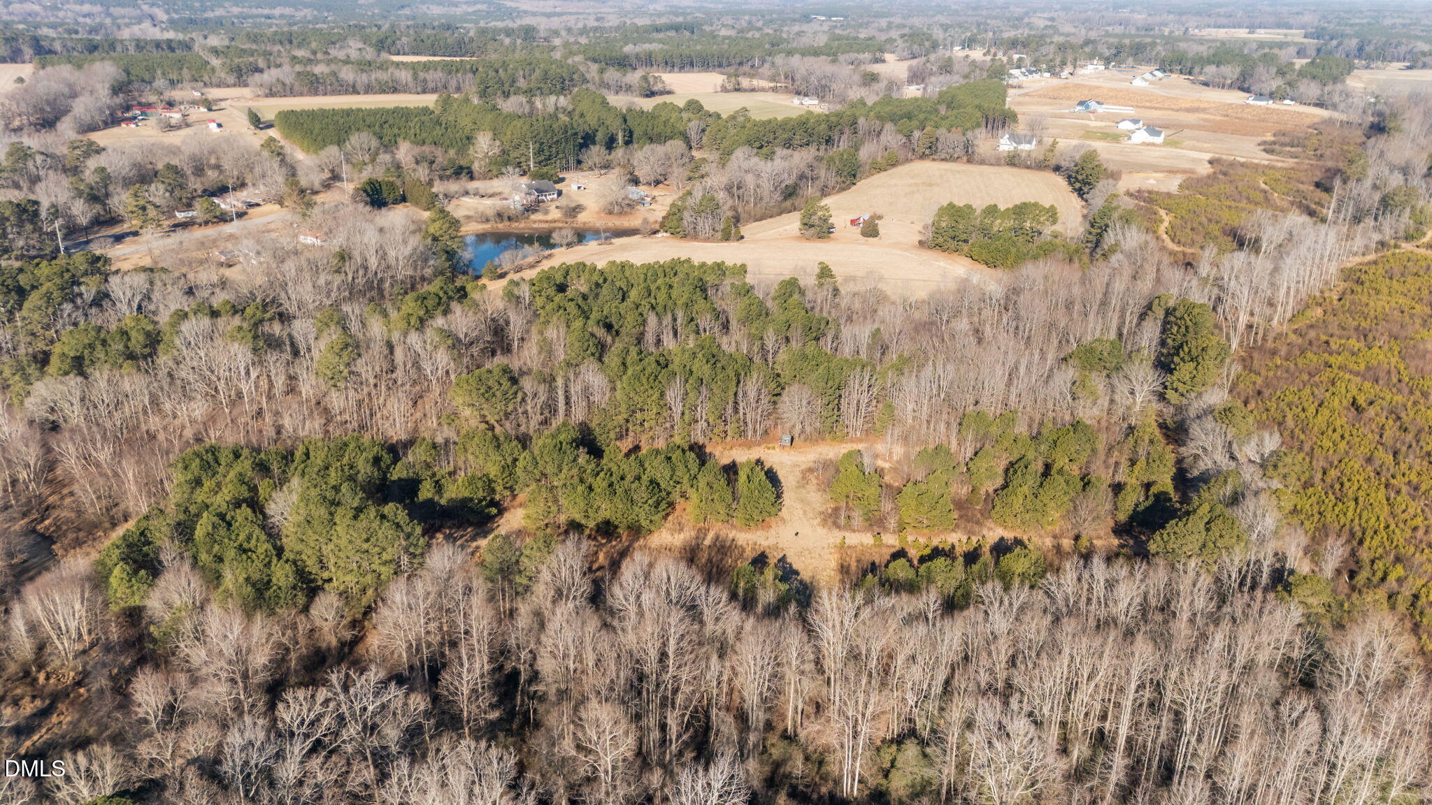 0 Leaflet Church Road Broadway, NC 27505 - Photo 3 of 5 a view of a lake with a yard
