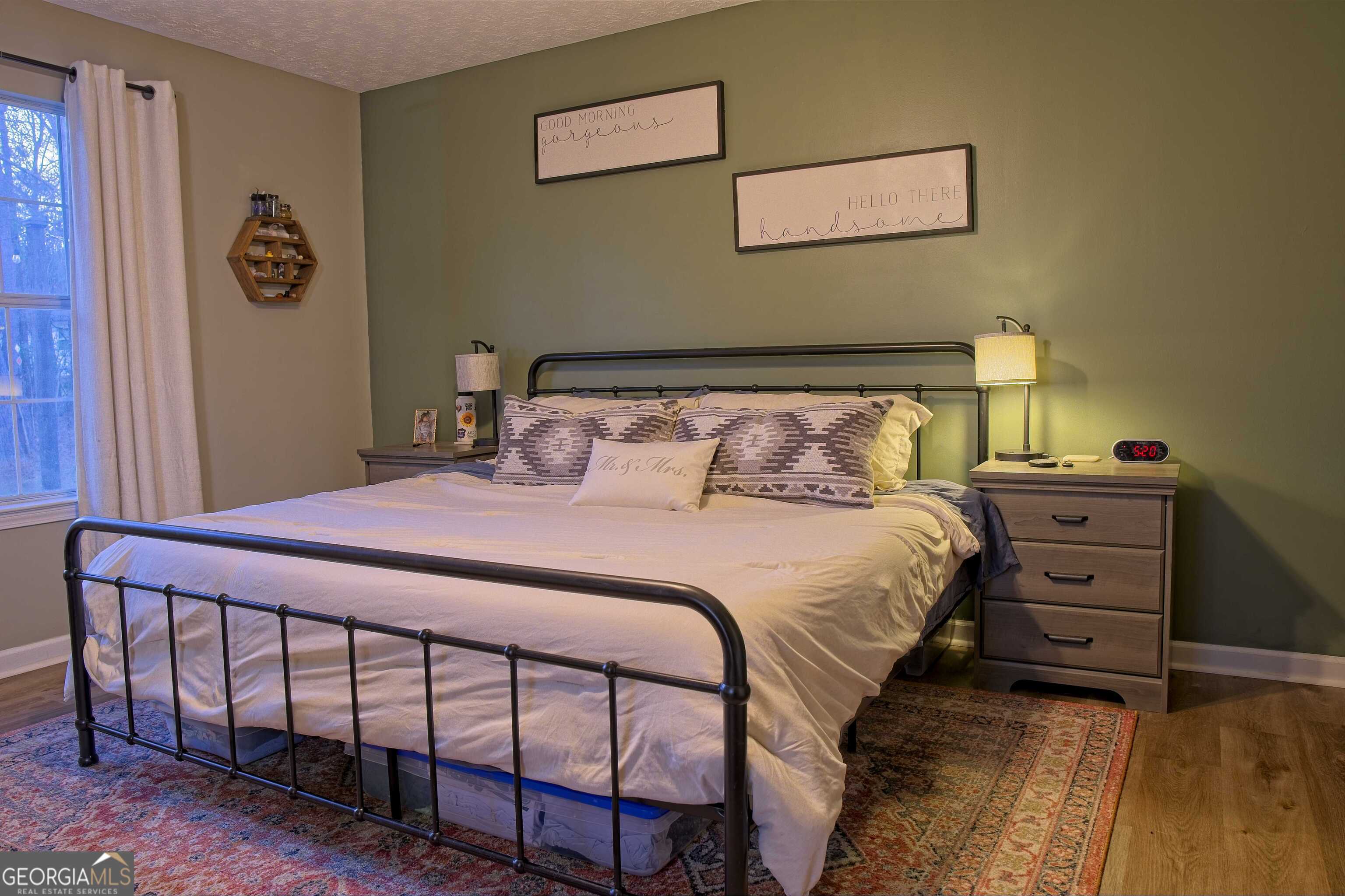 705 Baker Road Oxford, GA 30054 - Photo 25 of 50 a bedroom with a bed and a window