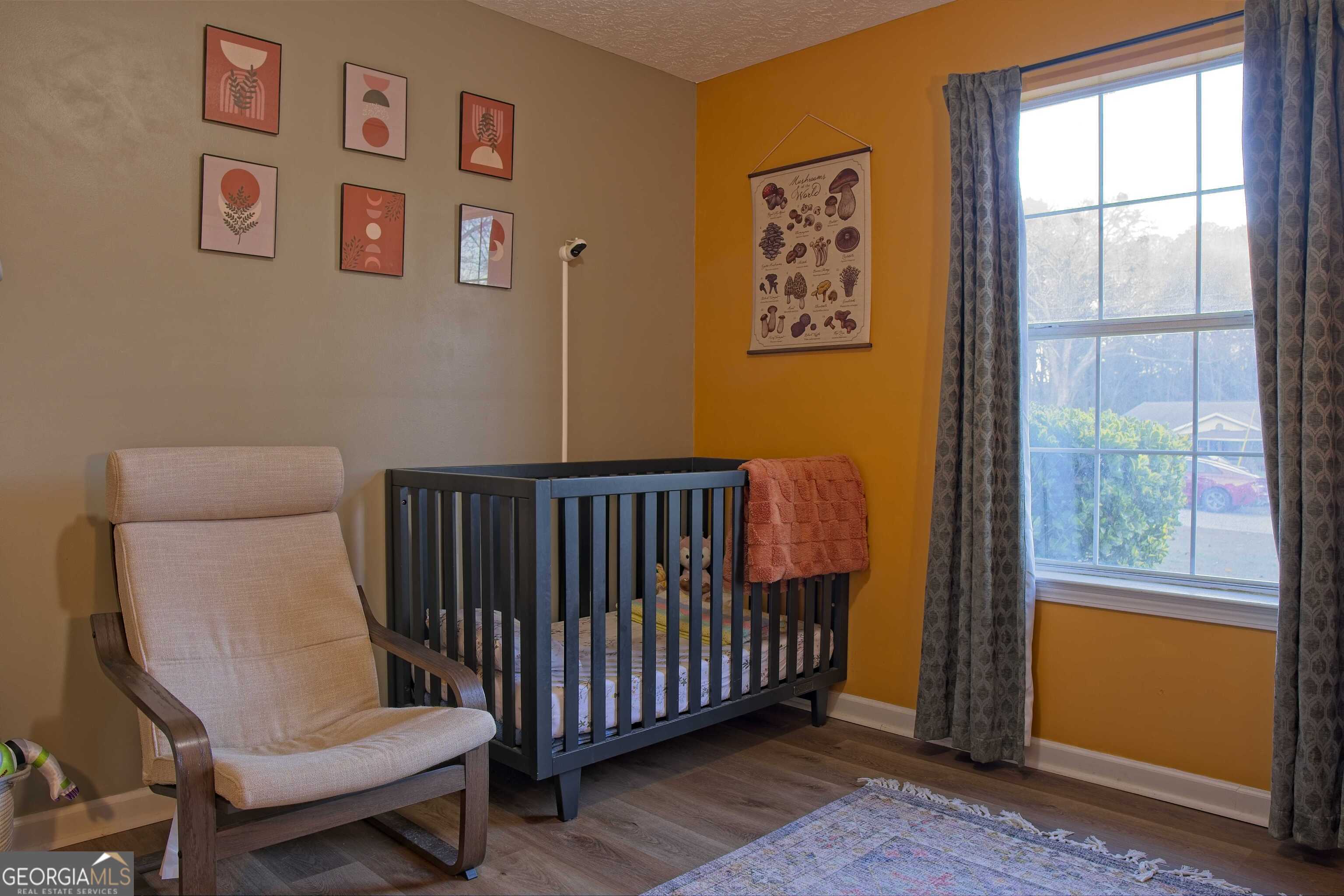 705 Baker Road Oxford, GA 30054 - Photo 36 of 50 a balcony with couple of furniture and a window