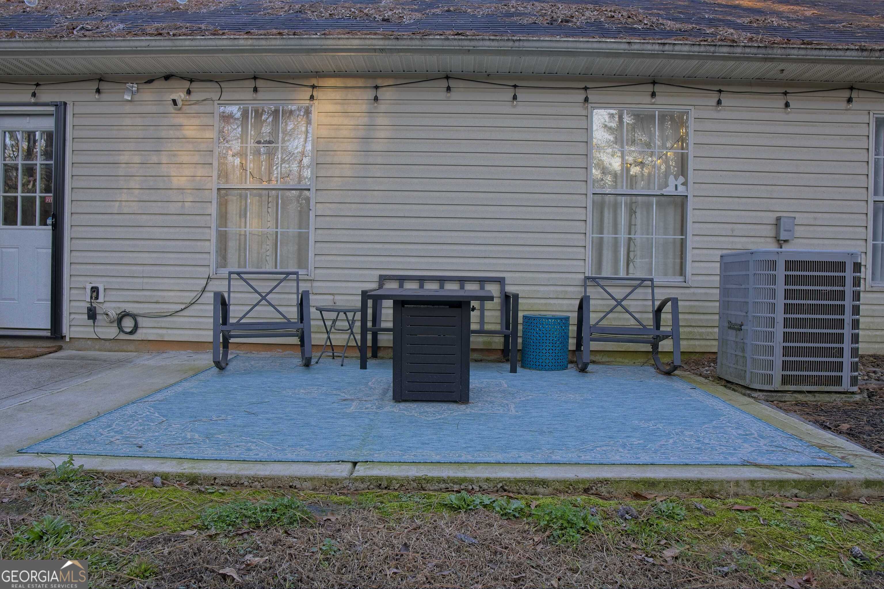 705 Baker Road Oxford, GA 30054 - Photo 43 of 50 a backyard of a house with seating space