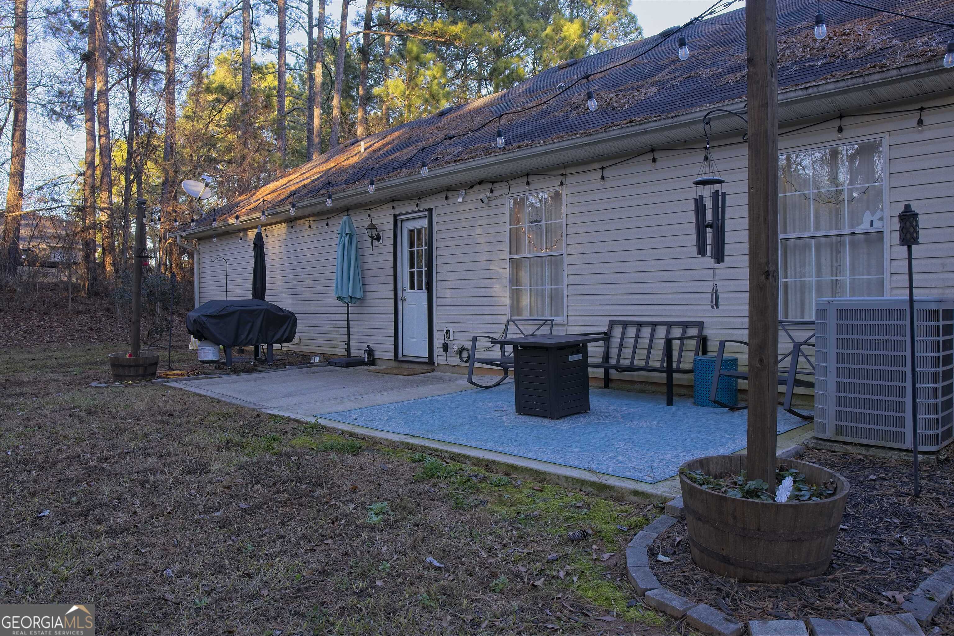 705 Baker Road Oxford, GA 30054 - Photo 45 of 50 a backyard of house with seating space