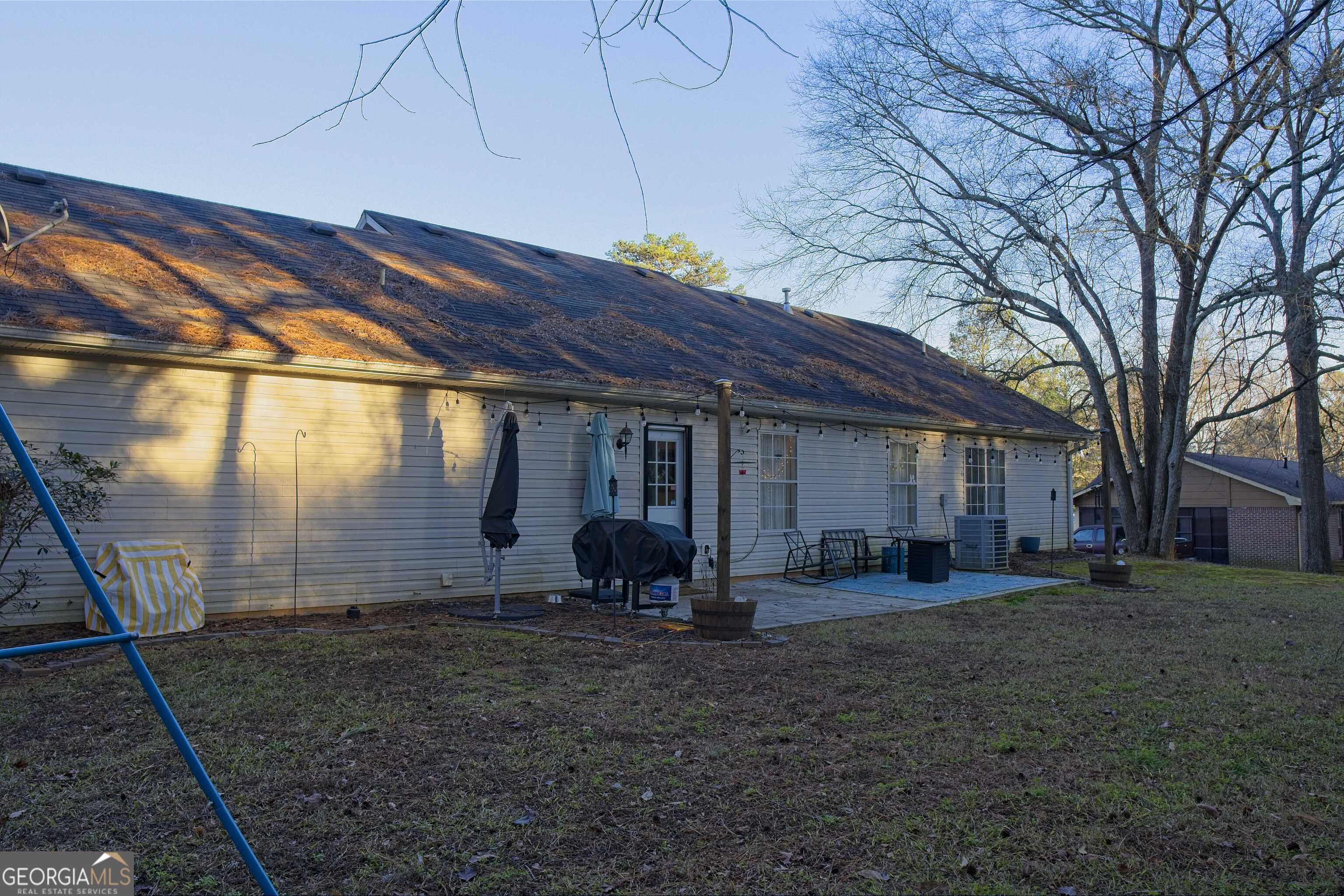 705 Baker Road Oxford, GA 30054 - Photo 46 of 50 a view of a house with a backyard