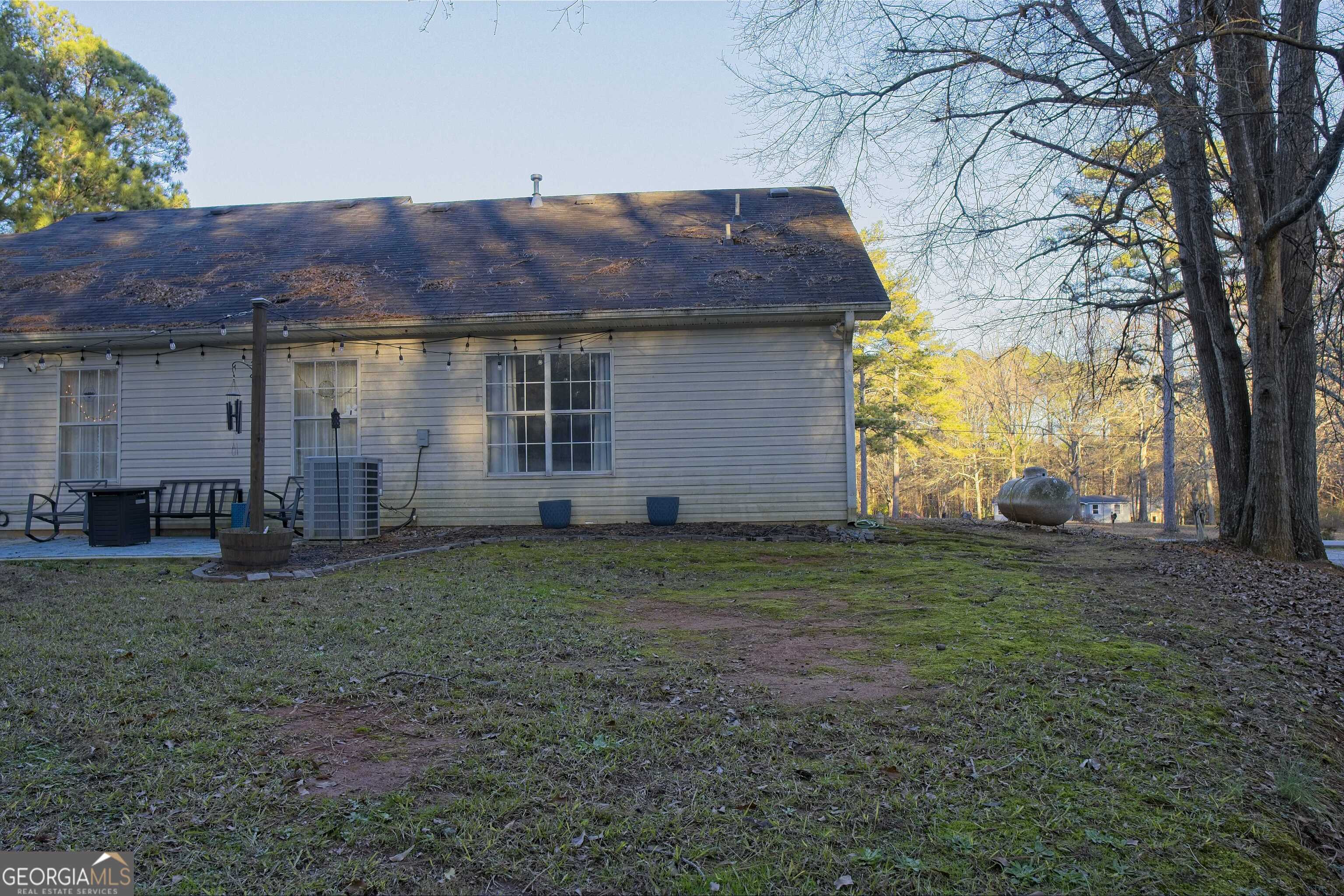 705 Baker Road Oxford, GA 30054 - Photo 48 of 50 a view of a house with a yard