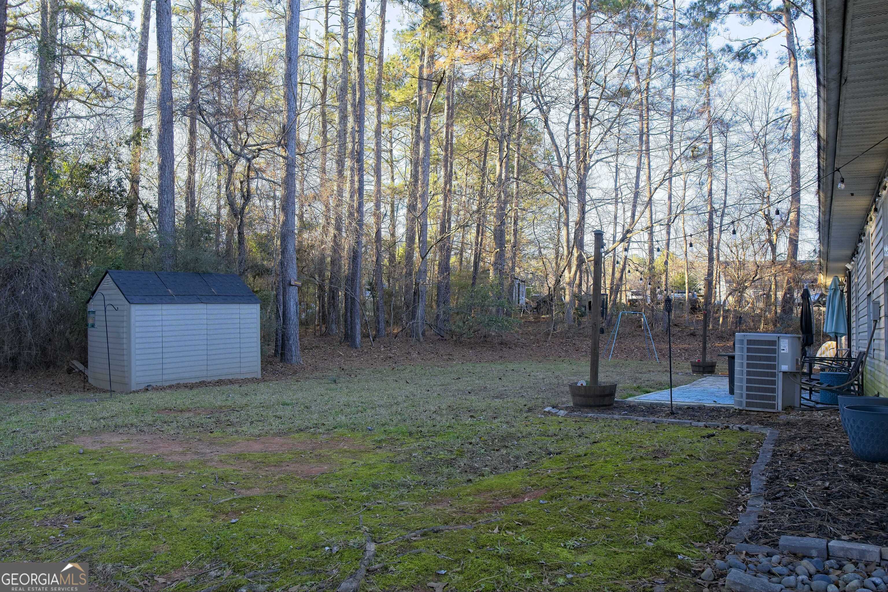705 Baker Road Oxford, GA 30054 - Photo 49 of 50 a view of backyard with green space