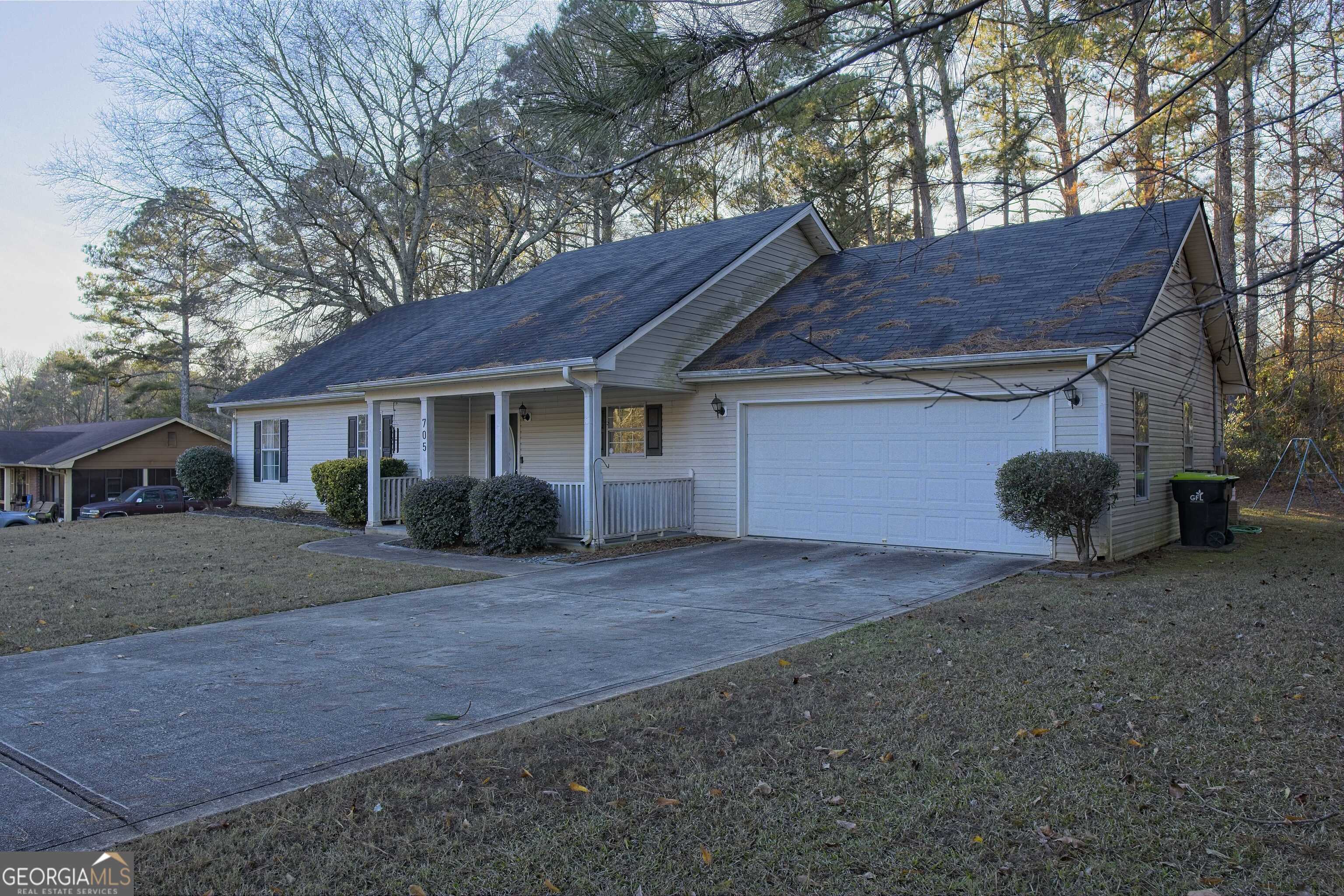705 Baker Road Oxford, GA 30054 - Photo 5 of 50 a view of a house with a yard