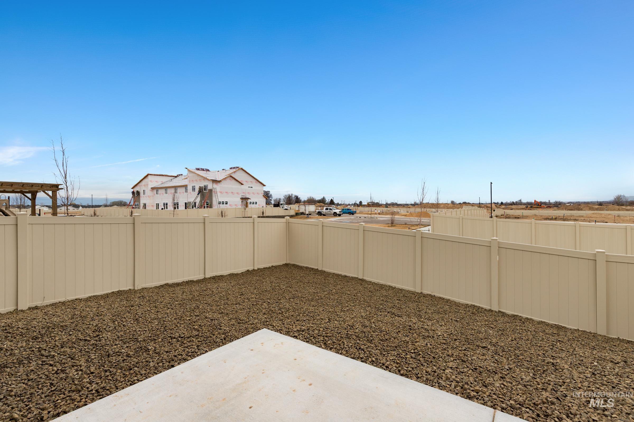 10832 Rutland Street Caldwell, ID 83605 - Photo 18 of 20 Fenced backyard with a patio area
