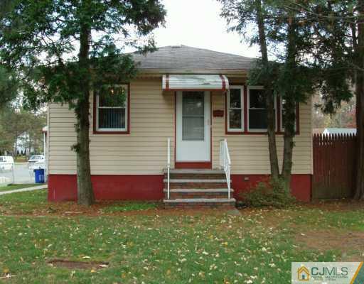 611 Inman Avenue Colonia, NJ 07067 - Photo 1 of 7 a view of house with backyard