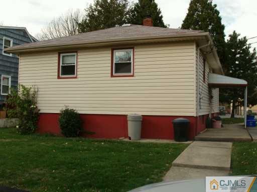 611 Inman Avenue Colonia, NJ 07067 - Photo 5 of 7 a view of house with backyard