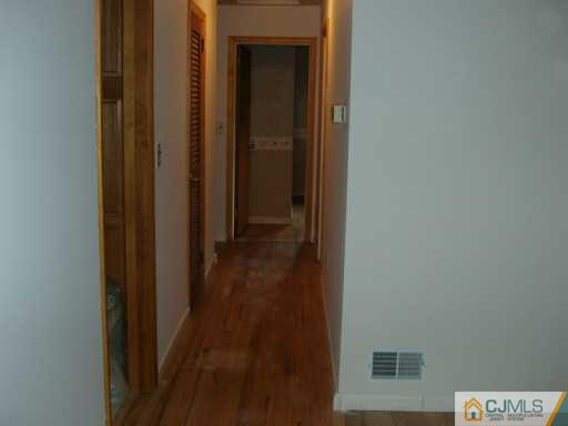 611 Inman Avenue Colonia, NJ 07067 - Photo 6 of 7 a view of a hallway