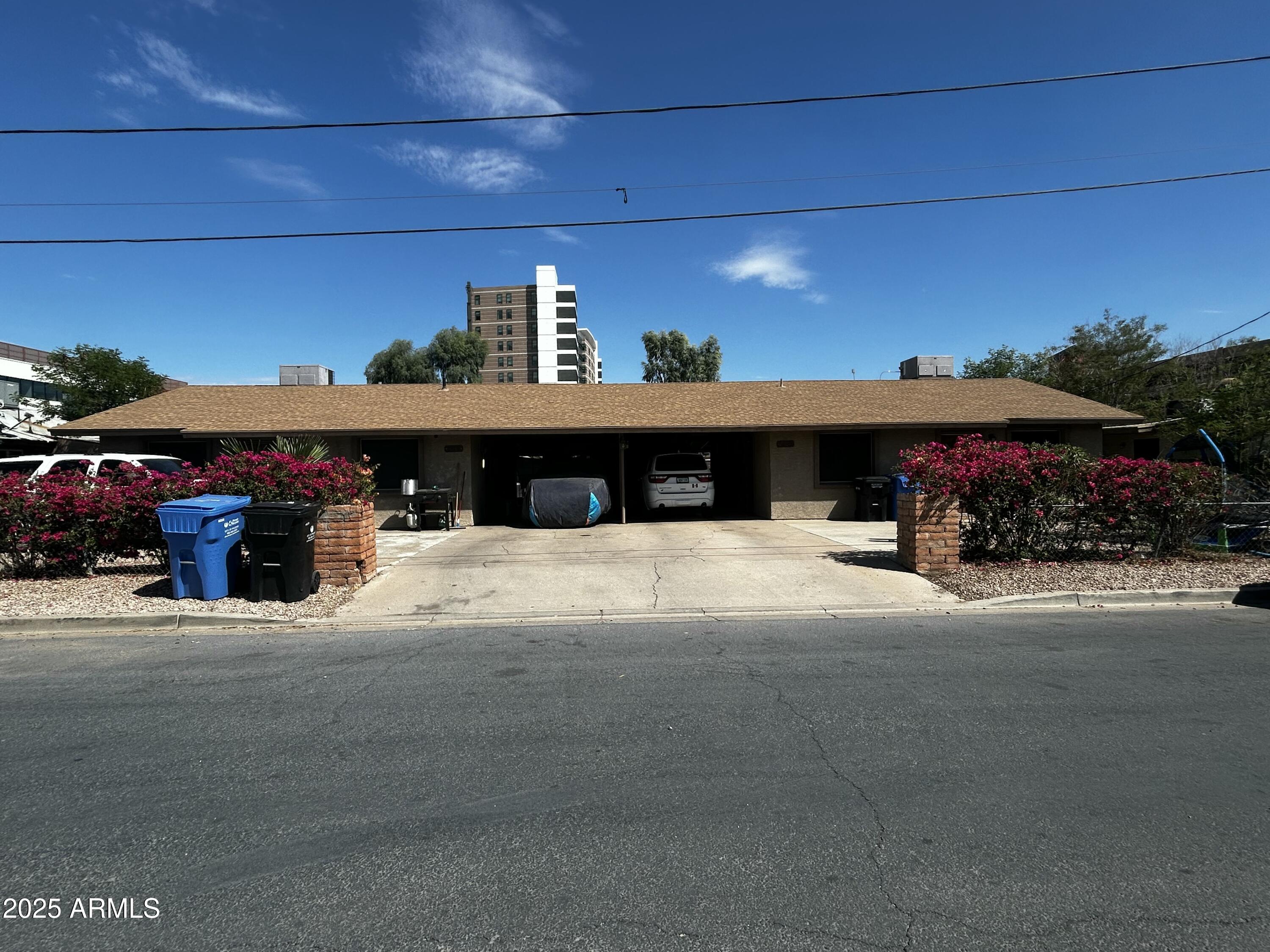 a view of a street with cars