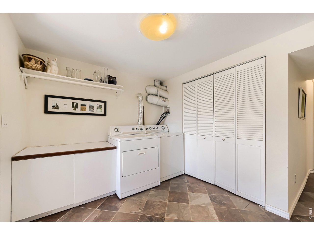 245 High Street Lyons, CO 80540 - Photo 19 of 49 Huge laundry space with utility sink around the corner