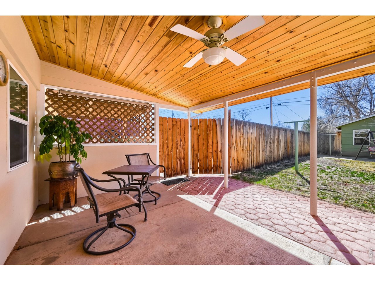 245 High Street Lyons, CO 80540 - Photo 20 of 49 Wonderful patio with ceiling fan to stay shaded and cool on hot days