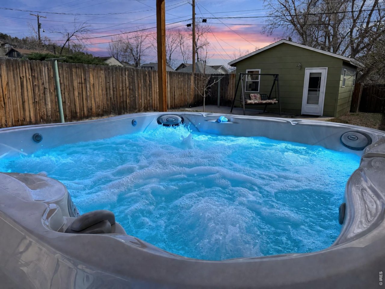 245 High Street Lyons, CO 80540 - Photo 25 of 49 Enjoy a twilight soak in your private backyard.