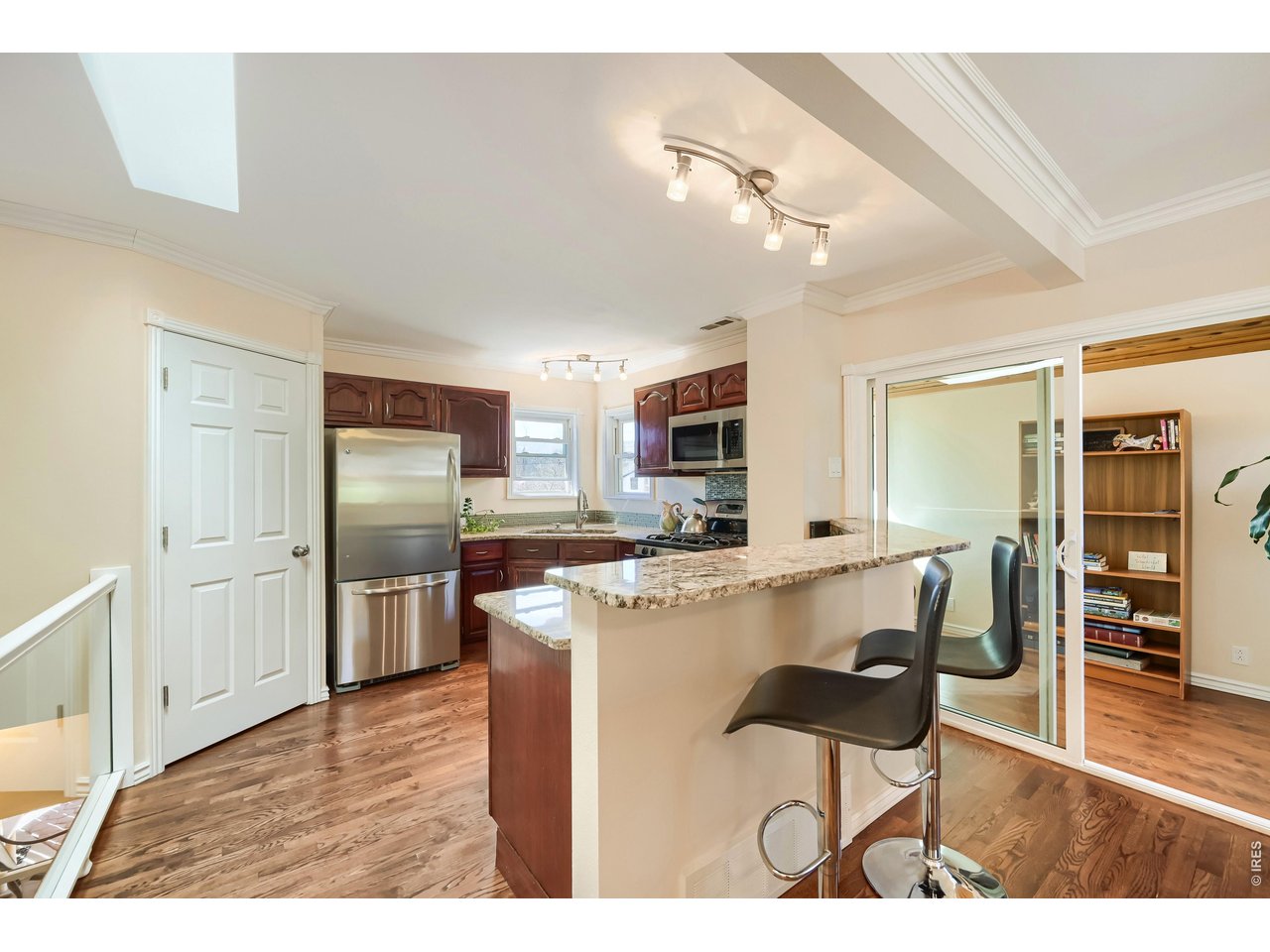245 High Street Lyons, CO 80540 - Photo 8 of 49 Walk-in kitchen pantry and breakfast bar