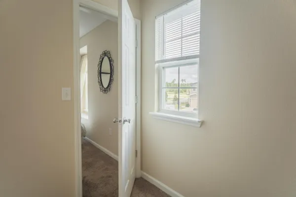 a bathroom with a toilet sink and vanity