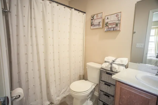 a bathroom with a sink and a toilet