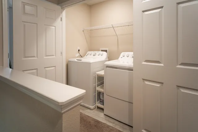 a bathroom with a sink a mirror and a shower