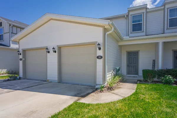 a backyard of a house with seating space