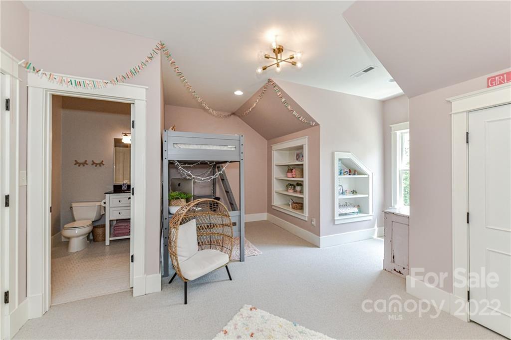 2826 Lake Shore Road South Denver, NC 28037 - Photo 25 of 48 a view of a livingroom with furniture and a ceiling fan