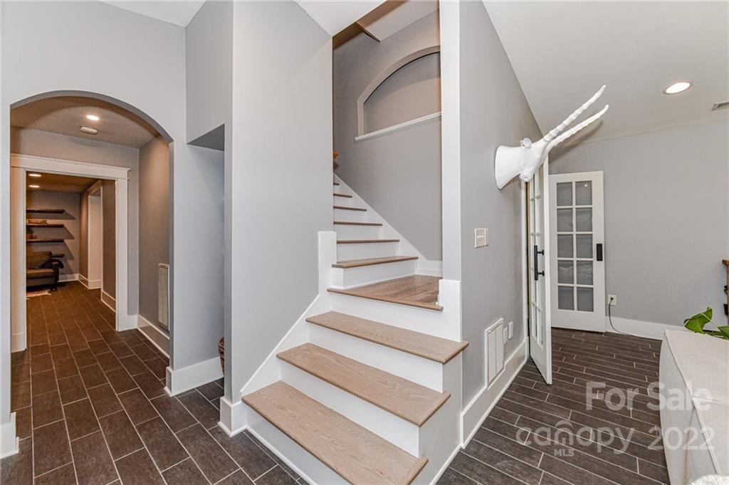 2826 Lake Shore Road South Denver, NC 28037 - Photo 28 of 48 a view of a hallway with wooden floor and staircase
