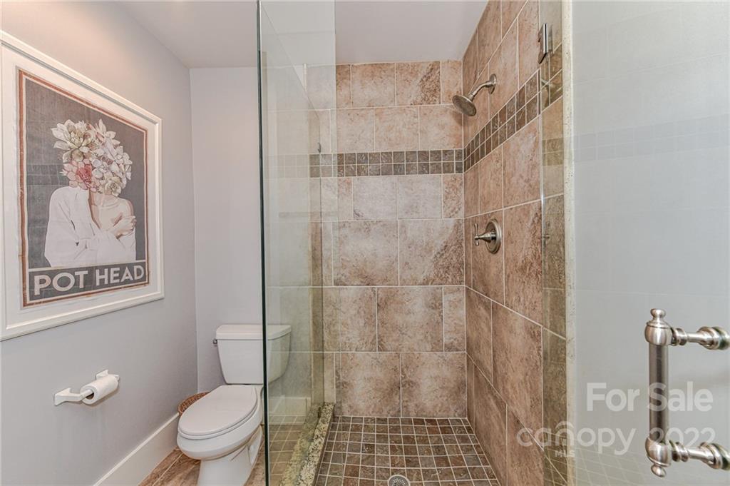 2826 Lake Shore Road South Denver, NC 28037 - Photo 33 of 48 a bathroom with a toilet and a shower