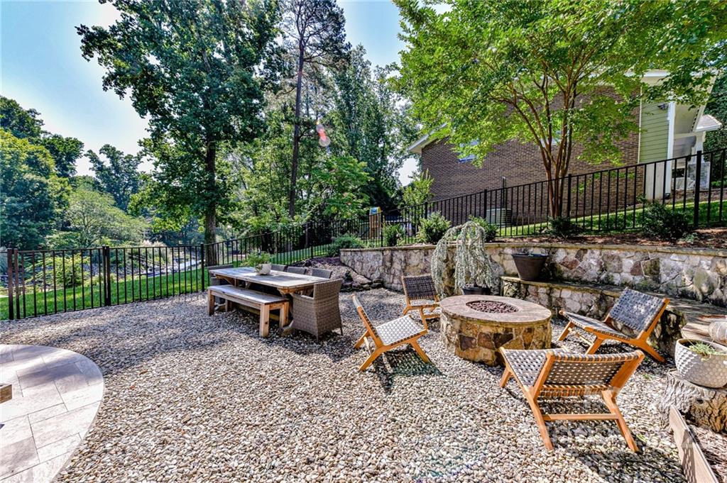 2826 Lake Shore Road South Denver, NC 28037 - Photo 39 of 48 a backyard of a house with outdoor seating