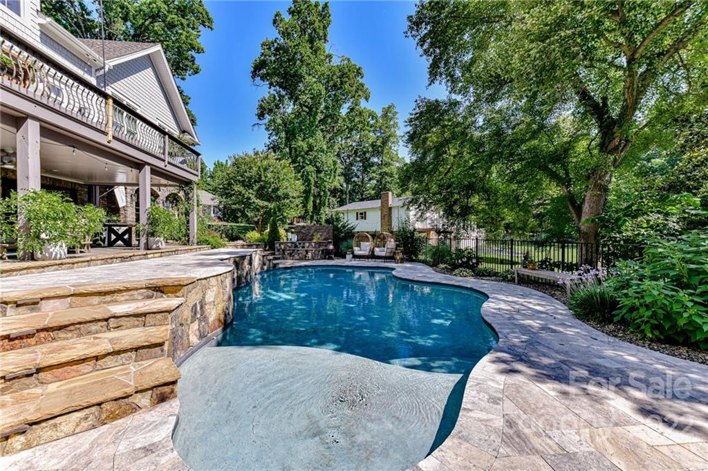 2826 Lake Shore Road South Denver, NC 28037 - Photo 41 of 48 a view of a swimming pool with sitting area