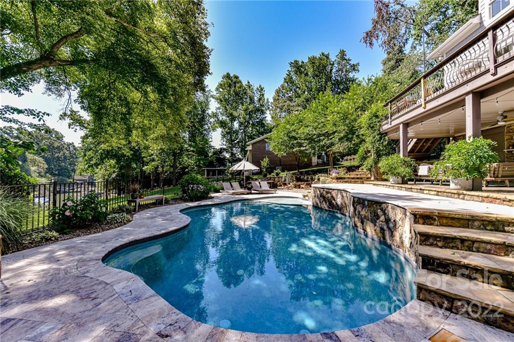 2826 Lake Shore Road South Denver, NC 28037 - Photo 42 of 48 a view of a swimming pool with a patio