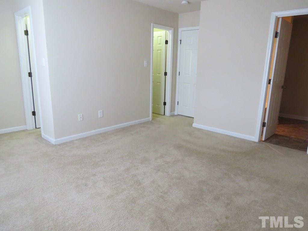 1043 Summerhouse Road Cary, NC 27519 - Photo 11 of 24 a view of an empty room