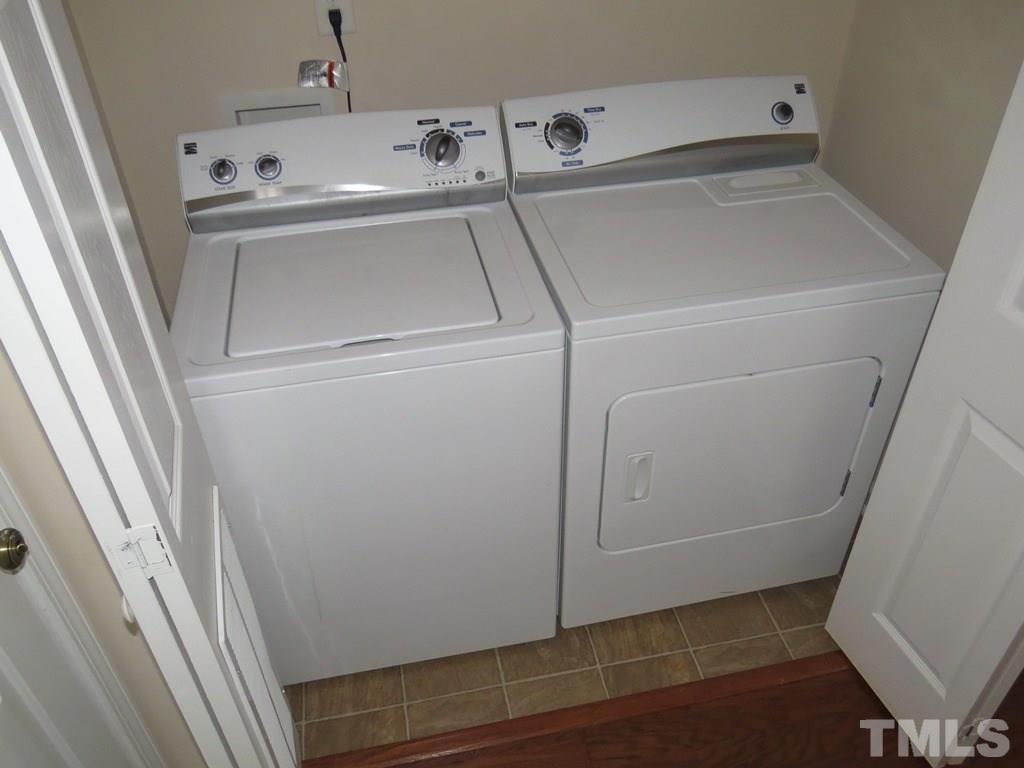 1043 Summerhouse Road Cary, NC 27519 - Photo 14 of 24 a utility room with dryer and washer