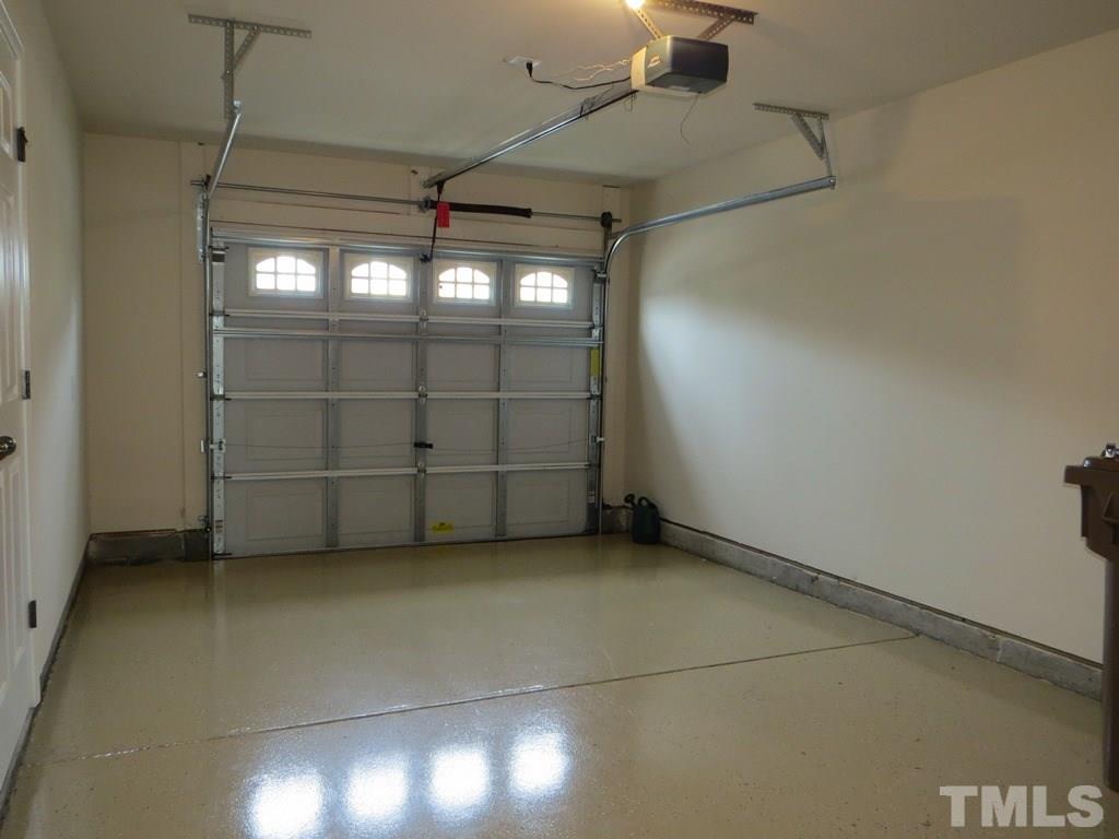 1043 Summerhouse Road Cary, NC 27519 - Photo 15 of 24 a view of a garage