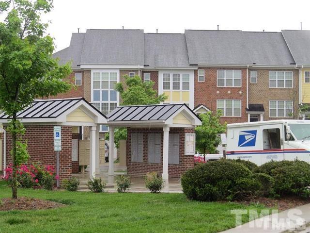 1043 Summerhouse Road Cary, NC 27519 - Photo 16 of 24 front view of a house with a yard