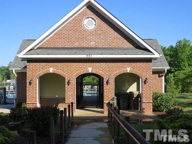 1043 Summerhouse Road Cary, NC 27519 - Photo 18 of 24 a front view of a house with garden
