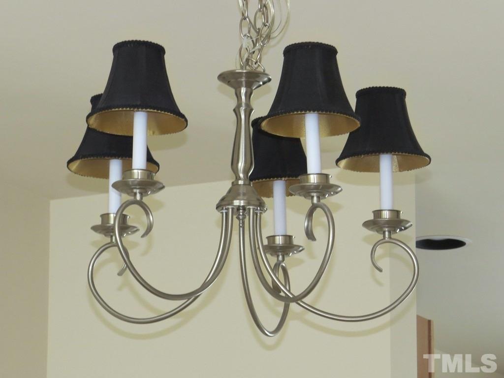 1043 Summerhouse Road Cary, NC 27519 - Photo 7 of 24 a lamp on a table in a kitchen