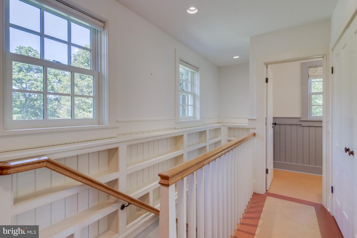 1201 Gold Mine Road Brookeville, MD 20833 - Photo 18 of 61 Custom shelving and entrance to the powder room