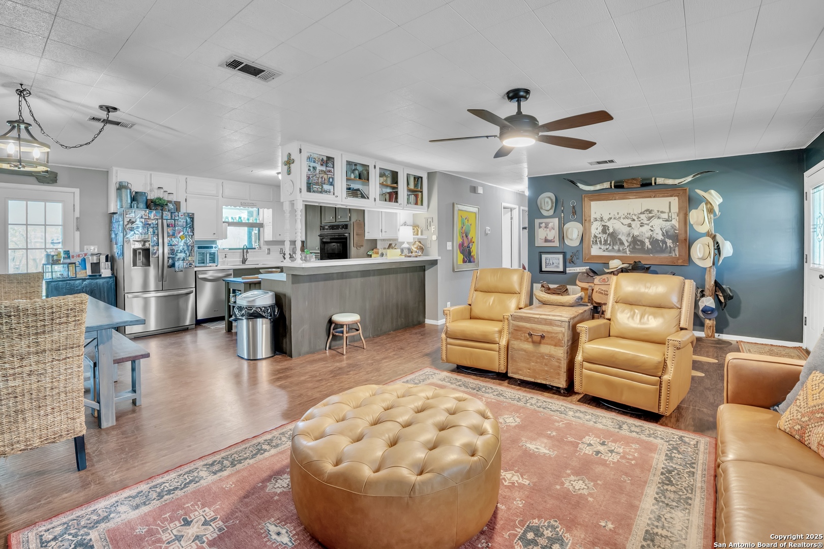 470 Rutledge Road Poteet, TX 78065 - Photo 11 of 40 a living room with furniture and a large window