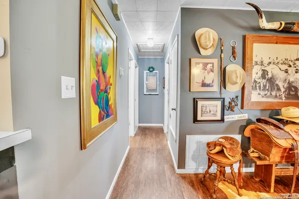 a view of an entryway with wooden floor