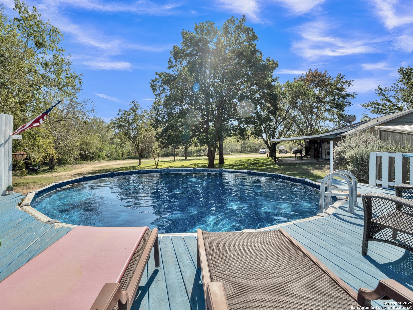 470 Rutledge Road Poteet, TX 78065 - Photo 25 of 40 swimming pool view with a outdoor seating