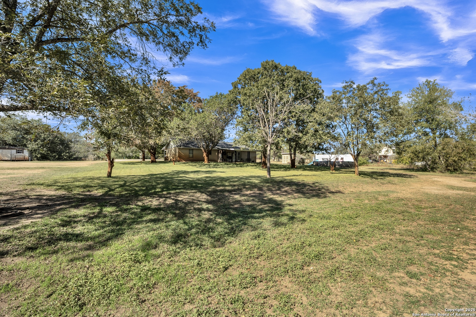 470 Rutledge Road Poteet, TX 78065 - Photo 29 of 40 a view of a park with large trees