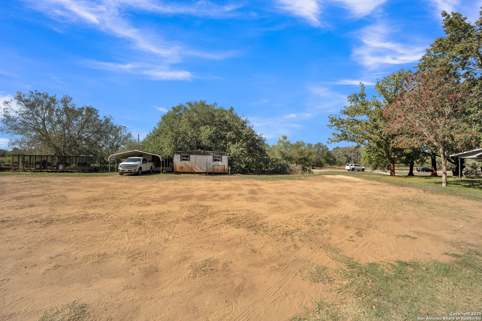 470 Rutledge Road Poteet, TX 78065 - Photo 30 of 40 a view of outdoor space yard and trees