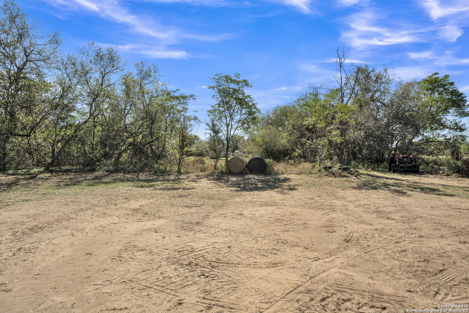 470 Rutledge Road Poteet, TX 78065 - Photo 32 of 40 a view of a yard with trees