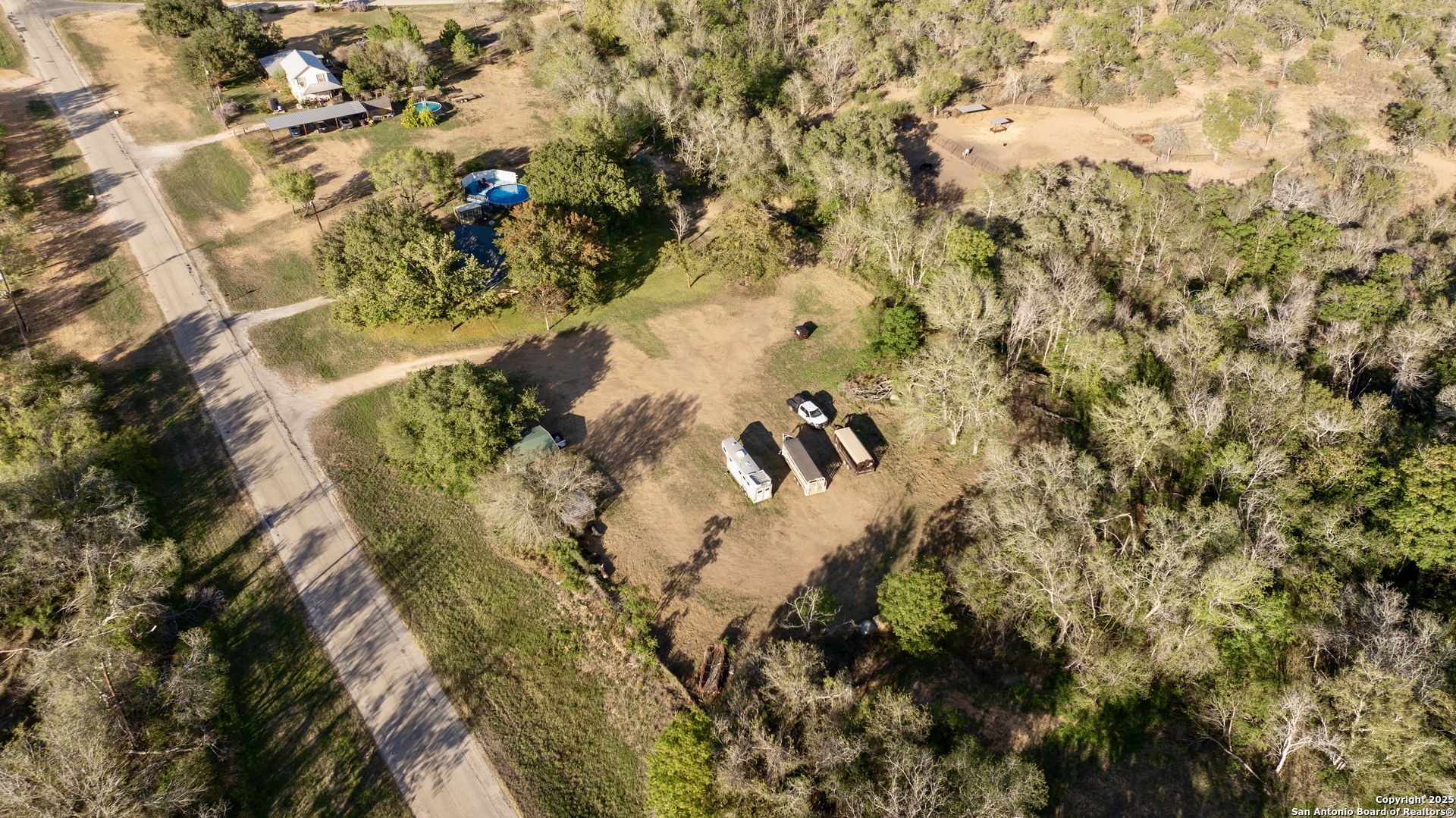 470 Rutledge Road Poteet, TX 78065 - Photo 39 of 40 a view of a forest with a tree