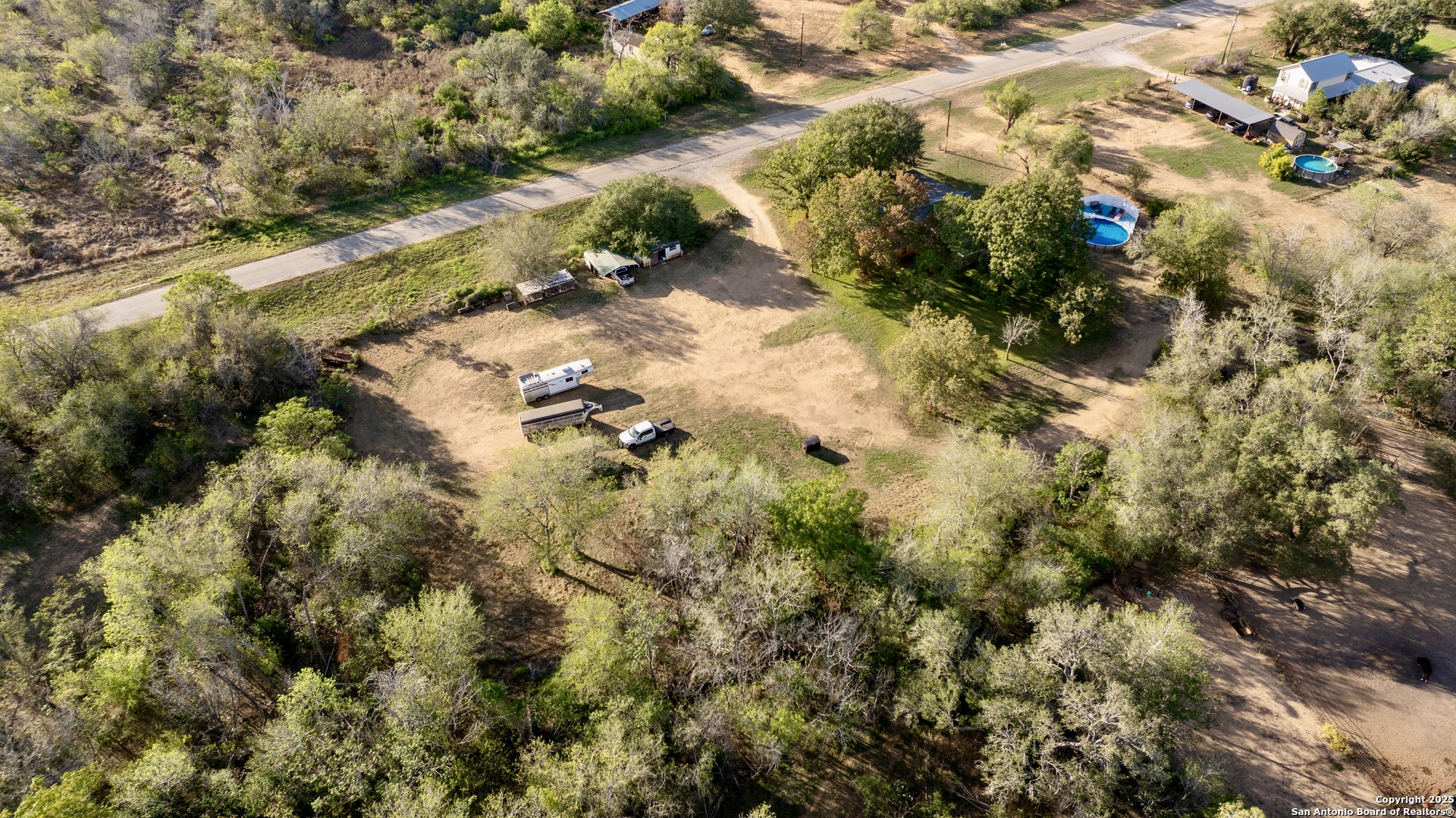 470 Rutledge Road Poteet, TX 78065 - Photo 40 of 40 a view of a yard with plants