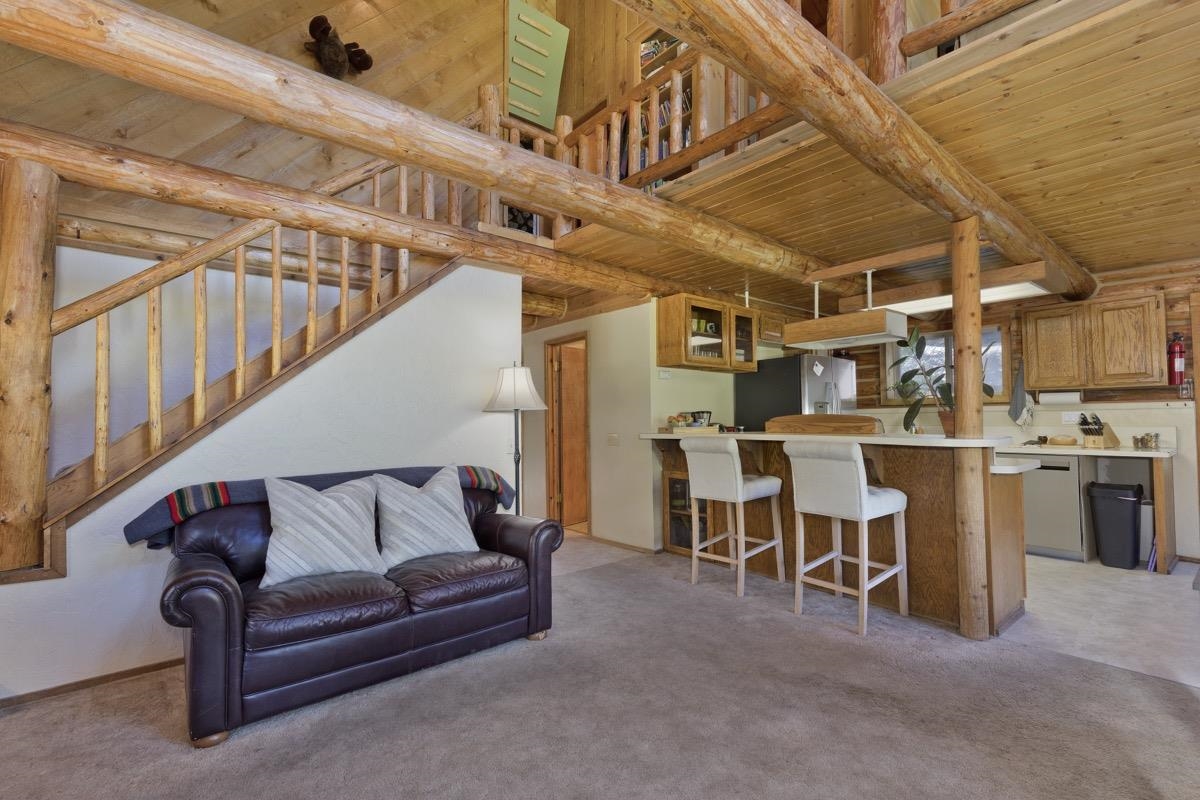 64 Carson Street June Lake, CA 93529 - Photo 11 of 47 a living room with lots of furniture and white walls