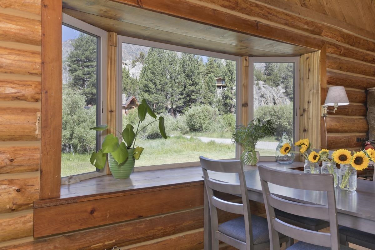 64 Carson Street June Lake, CA 93529 - Photo 3 of 47 a view of a porch with chairs and backyard
