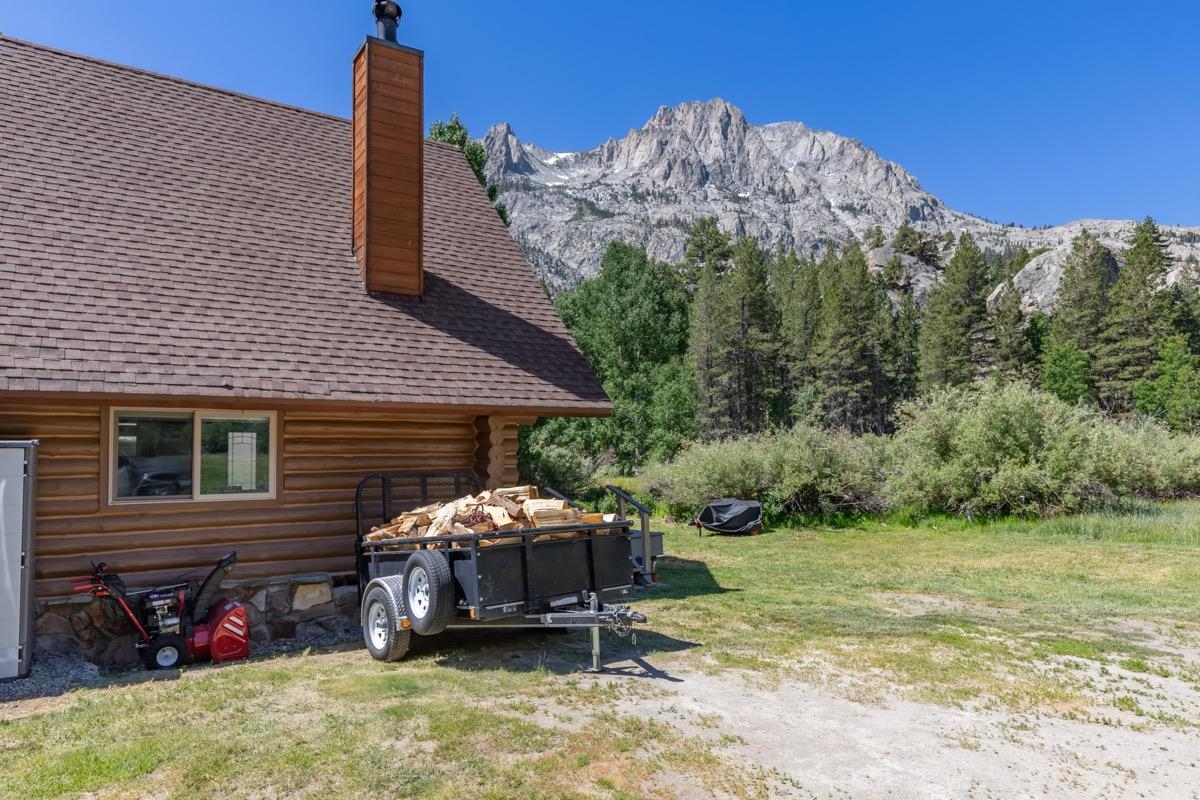 64 Carson Street June Lake, CA 93529 - Photo 35 of 47 a view of a house with a backyard and pathway