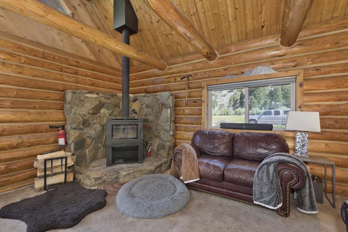 64 Carson Street June Lake, CA 93529 - Photo 9 of 47 a living room with furniture and a fireplace